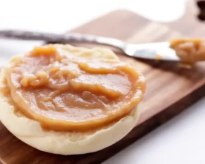 Homemade pear butter spread made from ripe pears with spices, perfect for toast.