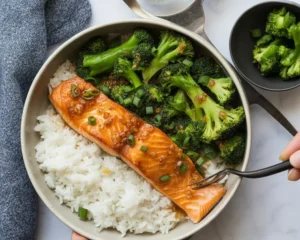 Plate of Air Fryer Honey Garlic Salmon garnished with herbs