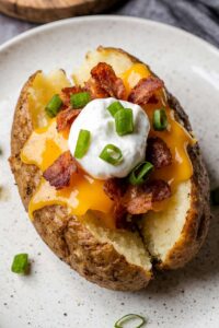Delicious air fryer baked potato with crispy skin and fluffy interior