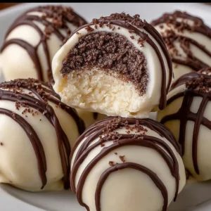 Delicious Baileys cheesecake balls topped with chocolate sprinkles.