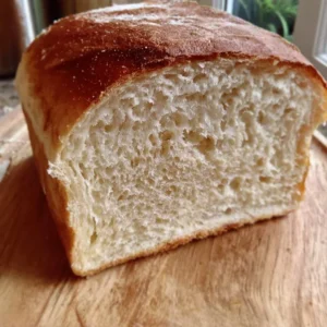 Sourdough sandwich loaf made from sourdough discard, sliced and ready to serve.