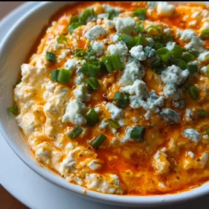 Buffalo cottage cheese dip served with veggies and chips