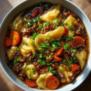 A bowl of deconstructed wonton soup with fresh ingredients and broth.