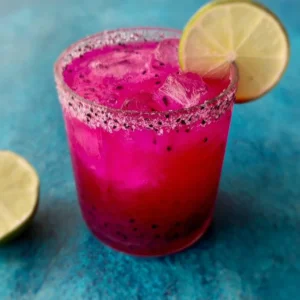 Delicious Dragonfruit Margarita served in a colorful cocktail glass