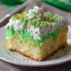Delicious St. Patrick’s Day Poke Cake with green frosting and festive decorations