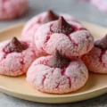 Delicious Strawberry Kiss Cookies with fresh strawberries on top