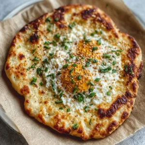 Viral cottage cheese flatbread topped with herbs and veggies