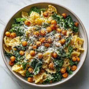 Kale Caesar Pasta Salad with fresh ingredients in a bowl