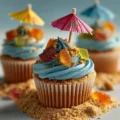 Fun and colorful beach cupcakes decorated with ocean-themed designs