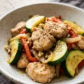 Chicken Zucchini Stir Fry with colorful vegetables in a wok
